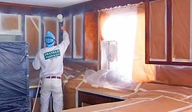 Professional Painter Performs Cabinet Refinishing